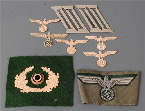 Lot 97 - A collection of German eagle collar tab...