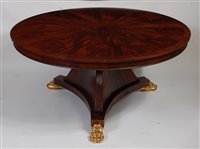 Lot 2648 - A mahogany centre table, in the Regency taste,...