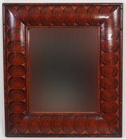 Lot 2674 - An oyster veneered cushion framed wall mirror...