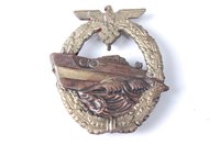 Lot 611 - A German Motor Torpedo war badge.