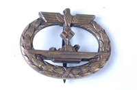 Lot 613 - A German kriegsmarine U-boat badge.