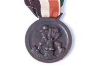 Lot 616 - A German Afrika Corps medal.