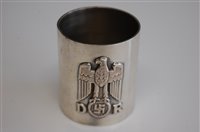 Lot 619 - A German silver napkin ring having relief...