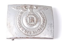 Lot 627 - A German SS belt buckle, marked RZM 155/40 SS.