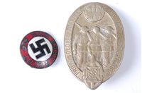 Lot 631 - .A German NSDAP party badge together with a...