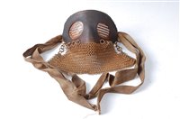 Lot 644 - A WW I Tank Crew splatter mask, having leather...