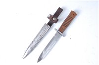 Lot 651 - A German trench fighting knife, the 15cm blade...