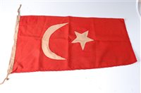 Lot 658 - A Turkish Ottoman cotton flag, 44 x 75cm.