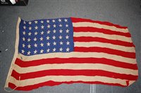 Lot 664 - A U.S. flag, stamped to the lanyard U.S....