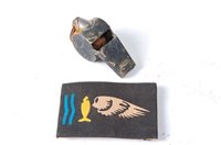 Lot 665 - An Air Ministry whistle together with a...