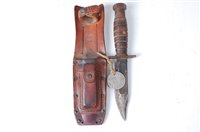 Lot 668 - An American Bowie type fighting knife in a...