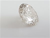 Lot 2580 - A loose diamond, the round brilliant cut...