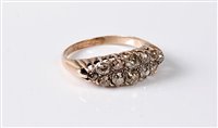 Lot 343 - A 15ct two row diamond ring, the old cut...