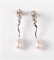 Lot 2676 - A pair of 18ct diamond and cultured pearl...