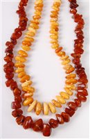 Lot 305 - Two amber bead necklaces - a butterscotch...