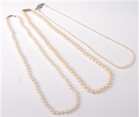 Lot 315 - Three cultured pearl necklaces, two with 9ct...