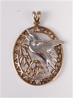 Lot 317 - A silver gilt, sapphire and diamond pendant,...