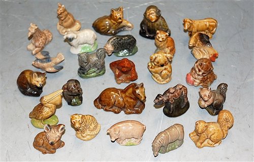 Lot 211 - Four various boxed Wade Whimsies; together...
