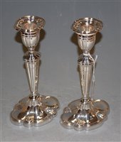 Lot 233 - A pair of Victorian style silver candlesticks,...