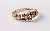 Lot 364 - A 9ct seed pearl ring, the posy style ring set...