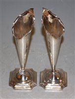 Lot 261 - A pair of Edwardian silver specimen vases,...