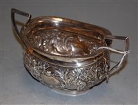 Lot 272 - A Regency style silver and embossed twin...