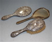 Lot 286 - An Edwardian embossed silver backed hair brush...