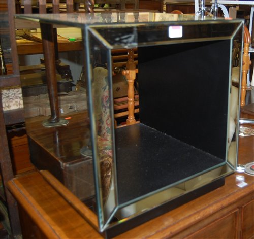 Lot 1253 - A contemporary mirrored Cube occasional table;...