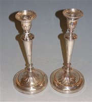 Lot 299 - A pair of Old Sheffield Plate candlesticks,...
