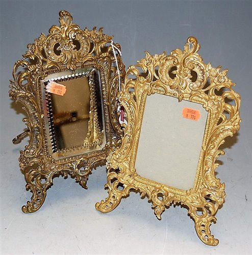 Lot 26 - A brass Rococo Revival easel dressing table...