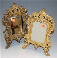 Lot 26 - A brass Rococo Revival easel dressing table...