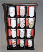 Lot 54 - A set of twelve Japanese porcelain beakers,...