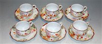 Lot 55 - A set of six Japanese eggshell teacups and...