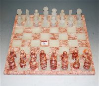 Lot 56 - A modern onyx and marble chess set with board
