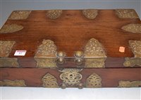 Lot 97 - An Eastern teak and brass bound fitted box