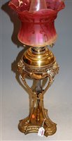 Lot 102 - A late Victorian brass oil lamp, having...