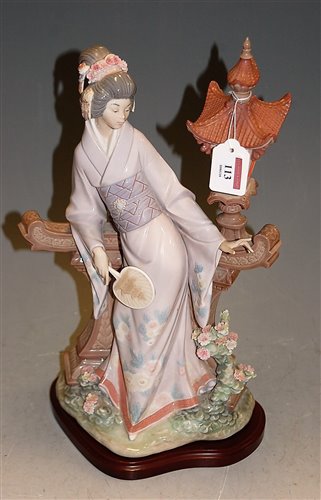 Lot 113 - A Lladro porcelain figure of a Japanese Geisha...