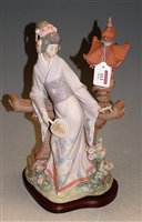 Lot 113 - A Lladro porcelain figure of a Japanese Geisha...
