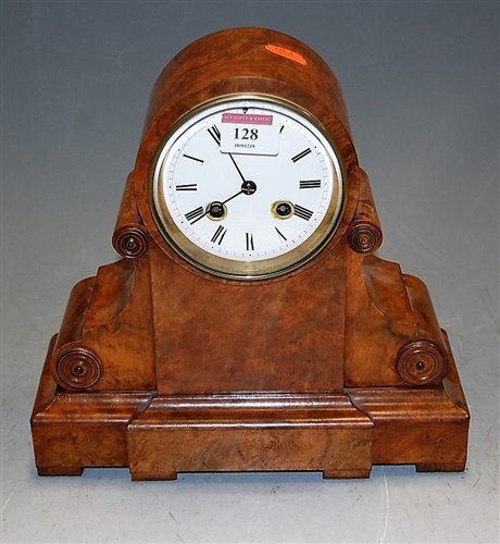 Lot 128 - A Victorian figured walnut cased mantel clock,...