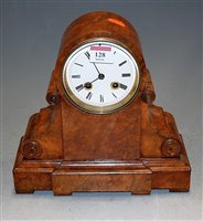 Lot 128 - A Victorian figured walnut cased mantel clock,...