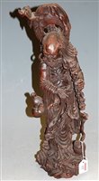 Lot 132 - An Oriental root carving as a peasant figure...