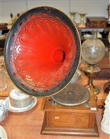 Lot 143 - An oak cased table-top gramophone, with trumpet