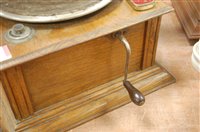 Lot 143 - An oak cased table-top gramophone, with trumpet