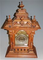 Lot 146 - A circa 1900 German walnut cased mantel clock,...