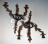 Lot 150 - A pair of Rococo style bronze two-branch wall...