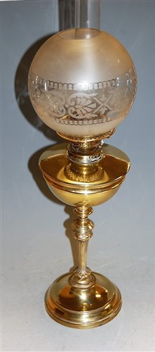 Lot 151 - A late Victorian polished brass oil lamp,...