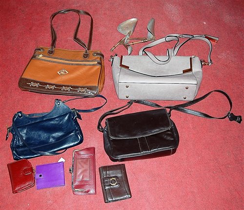 Lot 173 - A box of various leather handbags and purses
