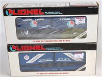 Lot 354 - 6 assorted Lionel flat cars with trailers...