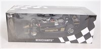 Lot 2534 - A Minichamps 1/18 scale model of a Lotus Ford...