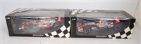 Lot 2537 - A Minichamps 1/18 scale F1 racing car group to...